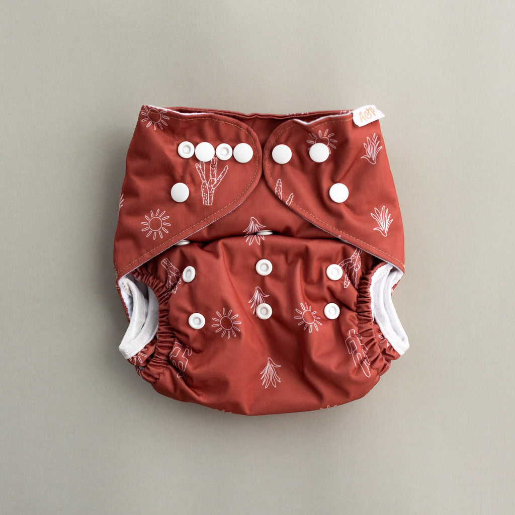 Desert Flower Cloth Nappy Cloth designed and owned cloth nappies. Sustainable baby products. Alice&Patrick Boutique